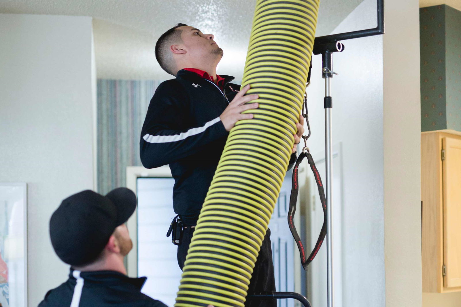 Technician Cleaning Air Ducts
