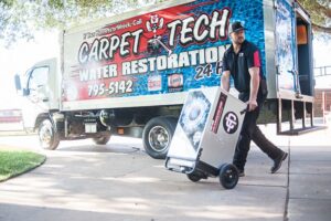 carpet tech employee outside carpet tech truck